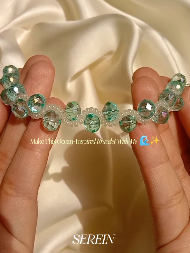 ✨ Ocean-Inspired Crystal Beaded Bracelet🌊 I made this elegant bracelet using crystal beads, white seed beads, and fishing line**, creating a sparkling ocean-inspired design that's perfect for everyday wear. 💙 Full tutorial drops tomorrow! Follow so you don't miss it. #beading #beadedbracelet  #braceletmaking  #diybracelet #beadingtutorial      