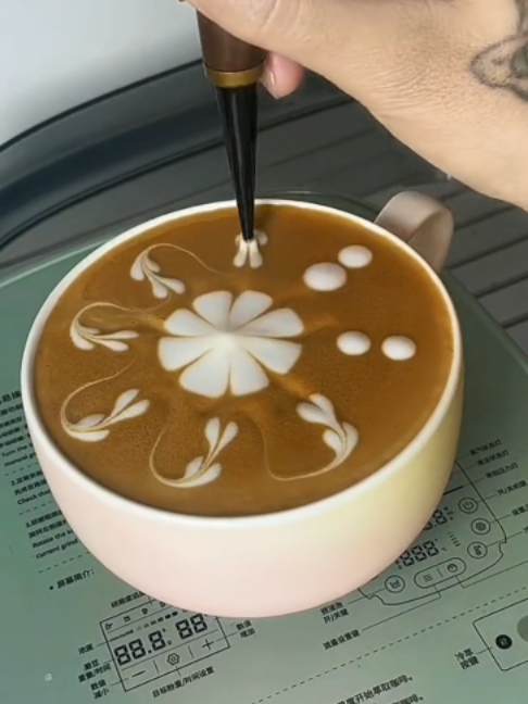 Follow me to learn how to make a simple latte art.#latte #coffee #cafe #fifaworldcup #footballtiktok #fypシ #fyp