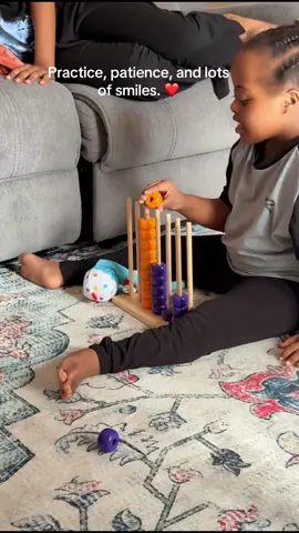 Today I’m sharing one of Zahra’s favorite learning toys. 🥹❤️ Watching her pick up each bead, match the colors, and place them on the rods makes my mama heart so happy. Every small step is a big victory, and I’m so proud of her. May Allah continue to bless her journey. 🤲💕.     #LearningThroughPlay #FineMotorSkills #DownSyndromeAwareness #ProudMama #TikTokShop 💕