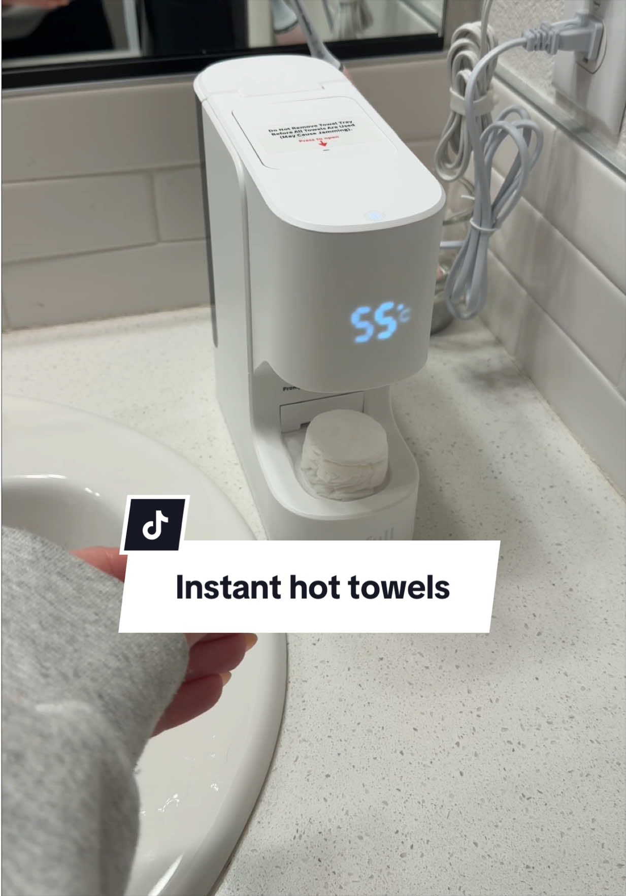 I did not know I needed a machine that makes warm spa towels until now 😂 You add water, drop in a compressed towel, press one button, and it comes out warm and ready to use! 🧖‍♀️ Warm towels in seconds ✨ One-button operation 💦 Heats, moistens & expands the towel 🏠 At-home spa experience #SkincareRoutine #HomeSpa #SelfCareEssentials #BeautyGadgets #SkincareTools 