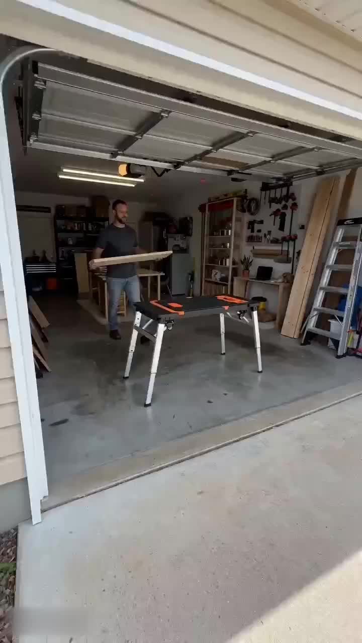 Stop using random boxes as workbenches... 🛑 This folding setup is a total garage cheat code! 🛠️