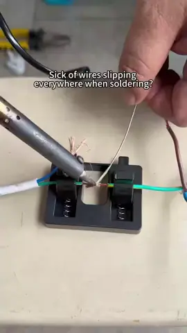 This wire soldering fixture makes cable repair super easy!  #ElectronicsDIY #SolderingTools #CableRepair #TechTools #DIYRepair