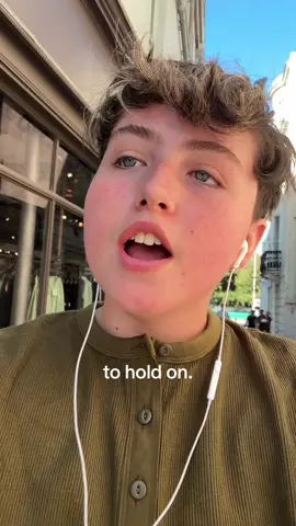 our gal had to cinematically hold on to her iced oat vanilla latte #cmbyn #holdingon 