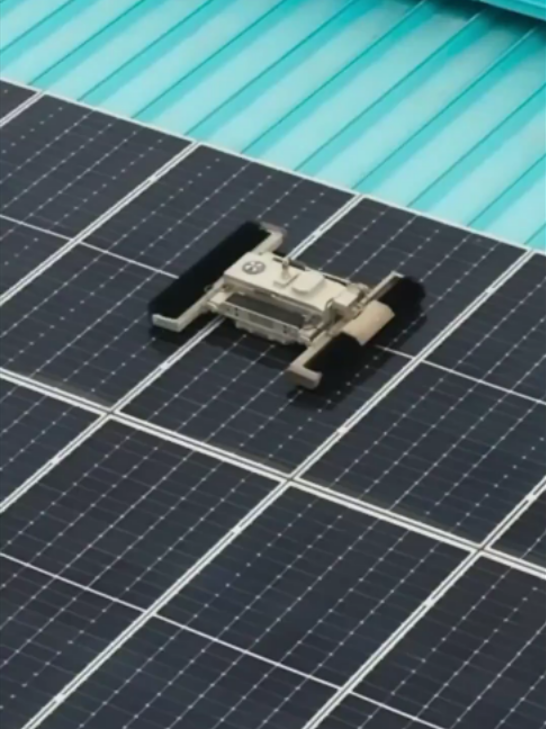 Smart cleaning robots deployed on rooftop solar panels in Eryuan, southwest China. Four smart cleaning robots are now maintaining 15,600 m² of rooftop solar panels in Eryuan County, southwest China's Yunnan Province. Capable of self-charging and scheduled operation, they continuously clear dust and debris to keep the panels running efficiently—making a previously labor-intensive, high-altitude task safer, smarter and more efficient. #WAIC2026 #AIInAction