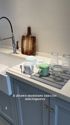 Most dish pads are eyesores—this smooth stone mat acts as counter decor while doing all the drying work. Fold compactly to tuck in drawers, absorbs drips instantly. #FunctionalDecor #KitchenStylingHacks #DecorativeDishMat #CounterStatementPiece #SinkMakeover