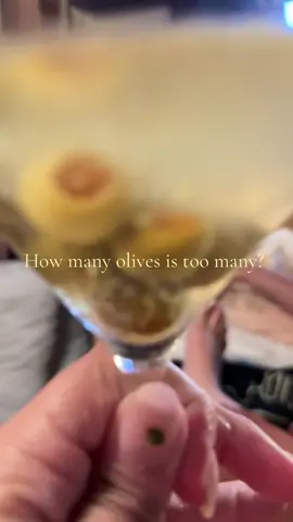 How many olives belong in a dirty martini? Personally, I stop counting once the olives start holding each other up. 😂🫒 Some people like one or two… I like enough that I don’t need an appetizer. Be honest… what’s your magic number? 👇 Team: 🫒 1–2 🫒🫒🫒 3–5 🫒🫒🫒🫒🫒 6+ (my people) #DirtyMartini #MartiniLover #OliveObsessed #CocktailTok #HappyHour     