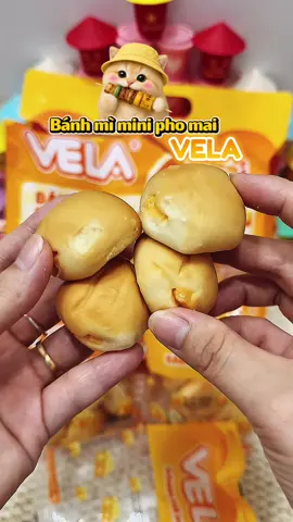 Nhỏ xinh nhưng “có võ”! 🍞🧀 Bánh mì mini VELA mềm mịn, nhân phô mai thơm béo, mỗi chiếc gói riêng tiện mang theo. Ăn một cái thấy ngon, ăn hai cái thấy thiếu, ăn hết bịch mới chịu! 😋 #BanhMiMini #VELA #PhoMai #AnVatNgon #AnSangTienLoi   