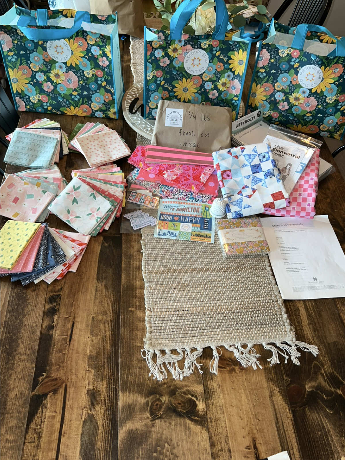 This is my haul from Quilt Town USA aka @Missouri Star Quilt Company. I had the best time shopping in all of the little shops! I am so glad I got to visit Hamilton, Missouri! I enjoyed getting to experience it with Vick! #quilttownusa #missouristarquiltco 
