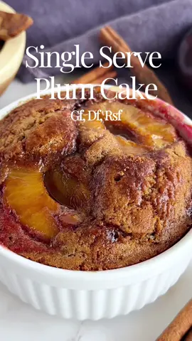 Single Serving Gluten Free Plum Cake 🍑 A healthy cake you can eat all by yourself! 🍰 full recipe with substitutions is on my site Did you know plums are full of antioxidants and fiber? Plus this cake is gluten free, dairy free, and refined sugar free. Plum Cake Ingredients: -2 Tbsp melted butter or coconut oil -2 Tbsp coconut sugar (plus more for topping) -1 egg -1/2 tsp vanilla extract -1 Tbsp milk of choice -1/4 cup 1:1 gluten free flour -1/4 tsp baking powder -1/8 tsp cinnamon  -pinch of salt -1 plum cut in half and pitted Preheat oven to 350 F. Whisk together the oil/butter and coconut sugar then add in the egg, vanilla, and milk and whisk until smooth. Add all the dry ingredients and mix until combined. Pour batter into a greased ramekin and press 2 halves of your plum, cut side up, into the batter. Sprinkle with coconut sugar and bake on a baking sheet for 20-25 minutes until a toothpick comes out clean. Let cool and enjoy! #plumcake #glutenfreecake #singleserving #healthycake #mugcake 