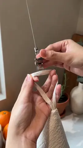 No more hanging towels.👏#kitchenorganization #lazylife #satisfying #kitchenhack #towelholder 