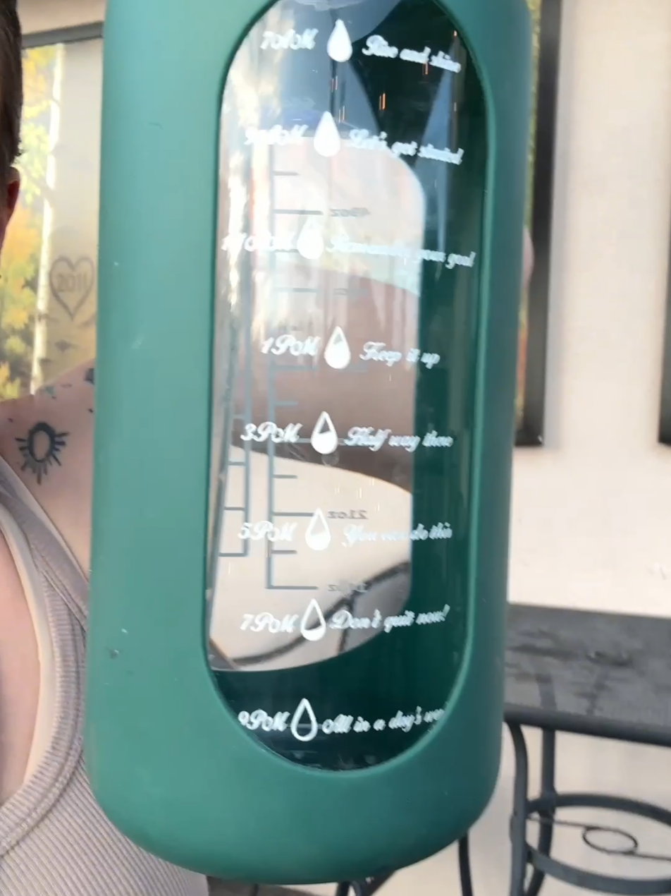 we always end up needing to stop for water multiple times and we don't want to use single use plastic. enter this huge glass bottle that we fill at the start of the trip and then refill as needed. it stays in the car during the trip and we always have water available in the event we need it. makes a great gift too! #tiktokshopcreatorpicks #waterbottle #glasswaterbottle #roadtripessentials #giftforher 