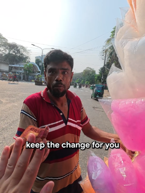 $0.20 cotton candy 🍭 #streetfood