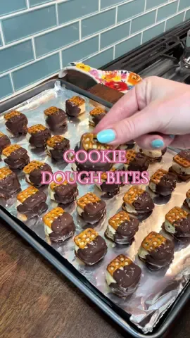 Cookie dough pretzel bites 🥨 The perfect sweet and salty dessert combination. Making homemade cookie dough is so easy and who doesn’t love chocolate covered pretzels. No bake desserts are the perfect recipe for summer.  Ingredients:  1 stick of butter, softened  1/4 cup sugar  1/2 cup brown sugar  2 tbsp milk  1/2 tbsp vanilla  Pinch of salt 1 and 1/4 cup flour (heat treated)  1 cup mini chocolate chips  Pretzels @Snyder’s of Hanover  Chocolate, melted  Flaky salt  #cookiedough #sweetandsalty #dessertideas #nobakedessert #easydessertrecipe 