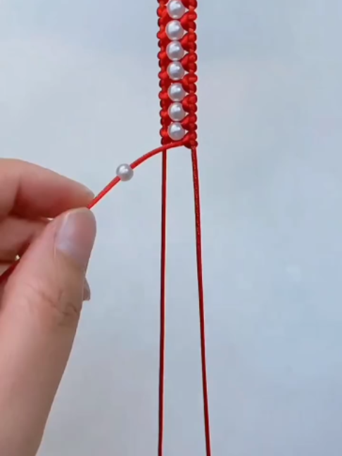 Step-by-Step Tutorial: Braiding a Classic Red Cord Pearl Bracelet #handmadejewelry #BeginnerCrafts #SlowStepbyStep #satisfying #macramelover #MacrameTutorial #macrameforbeginners