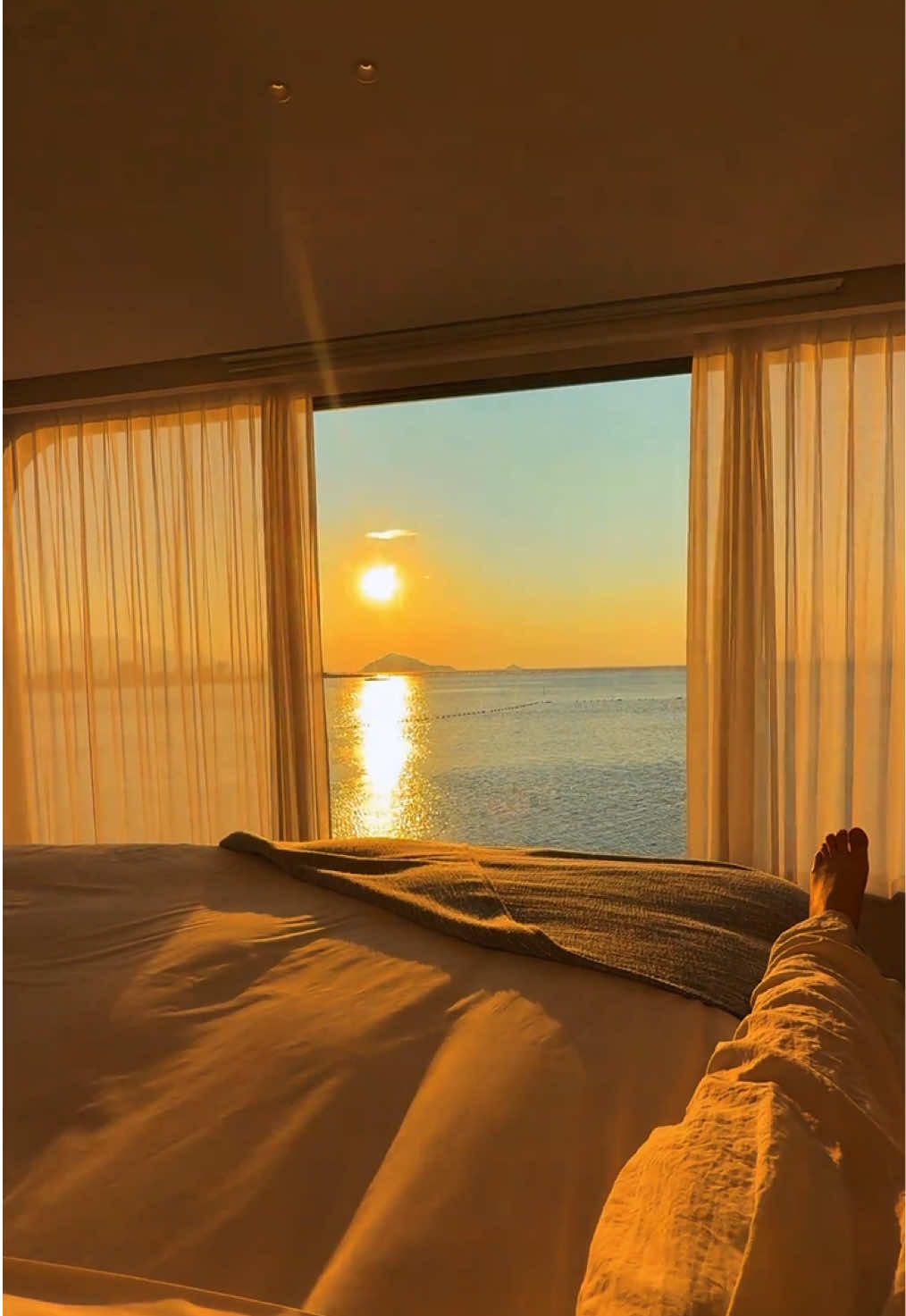Just imagine how magical it is to watch the sunset with your loved one in this vibe.🌅 Nothing beats this golden‑hour moment, adjusted perfectly by quiet motorized curtains. #sunset #smarthome #curtains #fyp #windowtreatments 