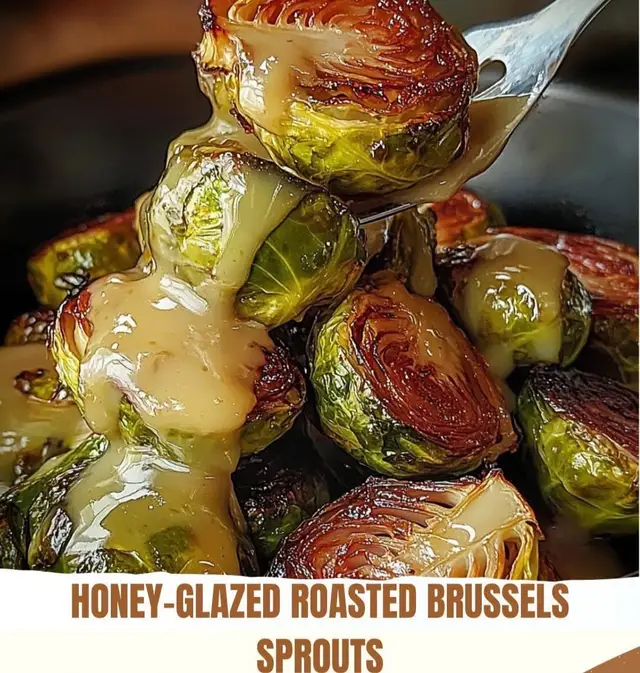Honey-Glazed Roasted Brussels Sprouts  Ingredients: 2 tablespoons olive oil 2 tablespoons honey 1/2 teaspoon salt 1 tablespoon balsamic vinegar 1 1/2 pounds Brussels sprouts, trimmed and halved 1/4 teaspoon black pepper Optional: 1/4 teaspoon red pepper flakes for a hint of spice Directions: Preheat the Oven: Preheat your oven to 400°F (200°C). Line a baking sheet with parchment paper or lightly grease it. Prepare the Brussels Sprouts: In a large mixing bowl, toss the halved Brussels sprouts with olive oil, salt, and pepper until evenly coated. Roast: Spread the Brussels sprouts in a single layer on the prepared baking sheet, cut side down. Roast in the oven for 20-25 minutes, or until golden brown and tender, stirring halfway through. Make the Glaze: While the Brussels sprouts are roasting, mix the honey, balsamic vinegar, and red pepper flakes (if using) in a small bowl. Glaze the Brussels Sprouts: Remove the Brussels sprouts from the oven and drizzle the honey-balsamic mixture over them. Toss gently to coat evenly. Finish Roasting: Return the glazed Brussels sprouts to the oven and roast for an additional 5-7 minutes, until caramelized and sticky. Serve: Transfer to a serving platter and enjoy warm as a delicious side dish. Prep Time: 10 minutes | Cooking Time: 30 minutes | Total Time: 40 minutes Servings: 4-6 #phototrend #FoodLover #recipesposteddaily #homecooking #followmyrecipes 