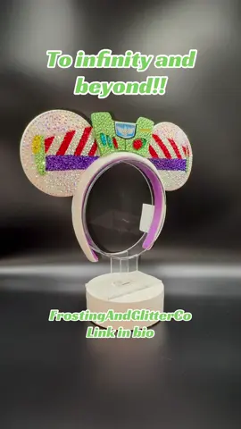 Buzz Lightyear mouse ears artfully hand embellished with gorgeous glass rhinestones. Purchase at FrostingAndGlitterCo on Etsy. https://frostingandglitterco.etsy.com/listing/4558442439 #buzzlightyear #toystory #disneyland #disneyworld #disney 