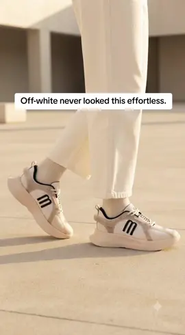 The Melissa X Beat sneaker in Off White pairs a chunky platform silhouette with translucent taupe panels and white mesh detailing for a versatile everyday look. Finished with the signature 