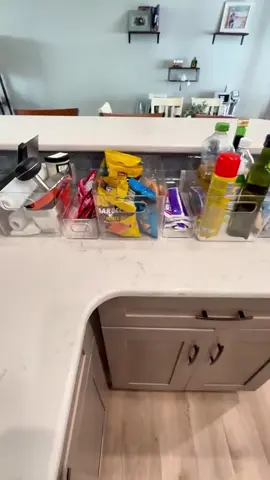 We love clear pantry bins because they keep everything organized while still allowing you a clear view of your food. Meal planning and choosing a snack have never been so easy. These deep shelves in pantries are also a challenge for a lot of our clients because things get lost in the back - that's where clear (and long) #organizing #organizingtips #organizingideas #homeorganizing #professionalorganizing 