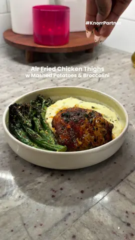 Air fried chicken thighs just got even better with @knorr's Roasted Chicken Premium Flavor Base. With just an air fryer and simple, everyday ingredients, Knorr adds more flavor, more boldness, and makes an easy dinner even better. Paired with creamy mashed potatoes and broccolini, this is a simple dinner that’s still packed with flavor. #KnorrPartner