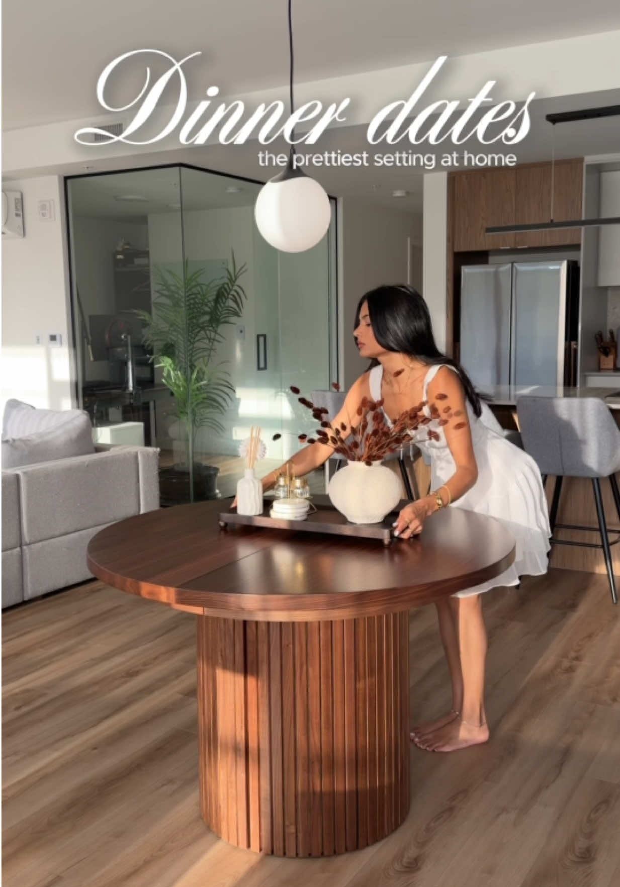 my kind of dinner setting 🤎 there’s nothing better than making a normal night at home feel a little more special. candles on, dinner made, a pretty table set & good company. this @Transformer Table has officially become one of my favourite pieces in our dining space, and I can already picture all the dinners and nights around it. shop with my code HELLI150 ✨