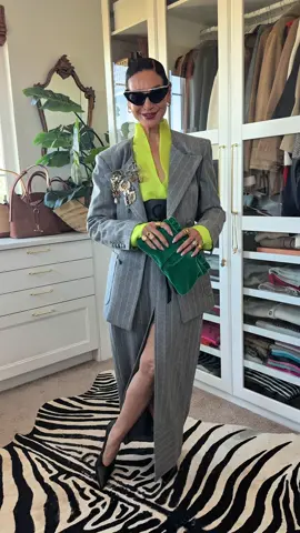 When the invite says, cocktails after work.  The workwear stays, the accessories get louder.  A classic pinstripe, a shot of color, a few too many brooches, which means just enough, oversized glasses and a little emerald velvet clutch. Sometimes you don’t need to change the outfit, you just need to turn up the personality. Would you wear your workwear like this after hours?  @TheKemist  @TheOpticalBoutique  @Dylan Lex 