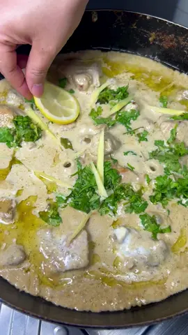 White chicken karahi recipe to impress friends and family  Ingredients For the Gravy * ½ litre milk * 4 onions * 4 green chillies * Cashews For the Chicken * Chicken — as needed * Oil — as needed * 1 tbsp ginger-garlic paste * 1 tsp coriander powder * 1 tsp cumin powder * ½ tsp white pepper * 1 tsp salt * ½ tsp black pepper * Yogurt — as needed * Fresh cream — as needed For Garnishing * Fresh coriander leaves * Ginger, and enjoy Method 1. Add milk, onions, green chillies and cashews to a pan and cook for 15 minutes. 2. Blend the cooked onion, chilli and cashew mixture into a smooth gravy. 3. Heat oil in a separate pan and add the chicken. 4. Add ginger-garlic paste, coriander powder, cumin powder, white pepper, salt and black pepper. Cook well. 5. Add yogurt and cook for about 15 minutes. 6. Add the blended gravy and continue cooking until the chicken is fully cooked. 7. Add fresh cream and mix well. 8. Garnish with fresh coriander and ginger. 9. Serve hot and enjoy this creamy, flavorful White Chicken Karahi! #WhiteChickenKarahi #chickenkarahi #whitekarahi #chickenrecipe #pakistanifood 