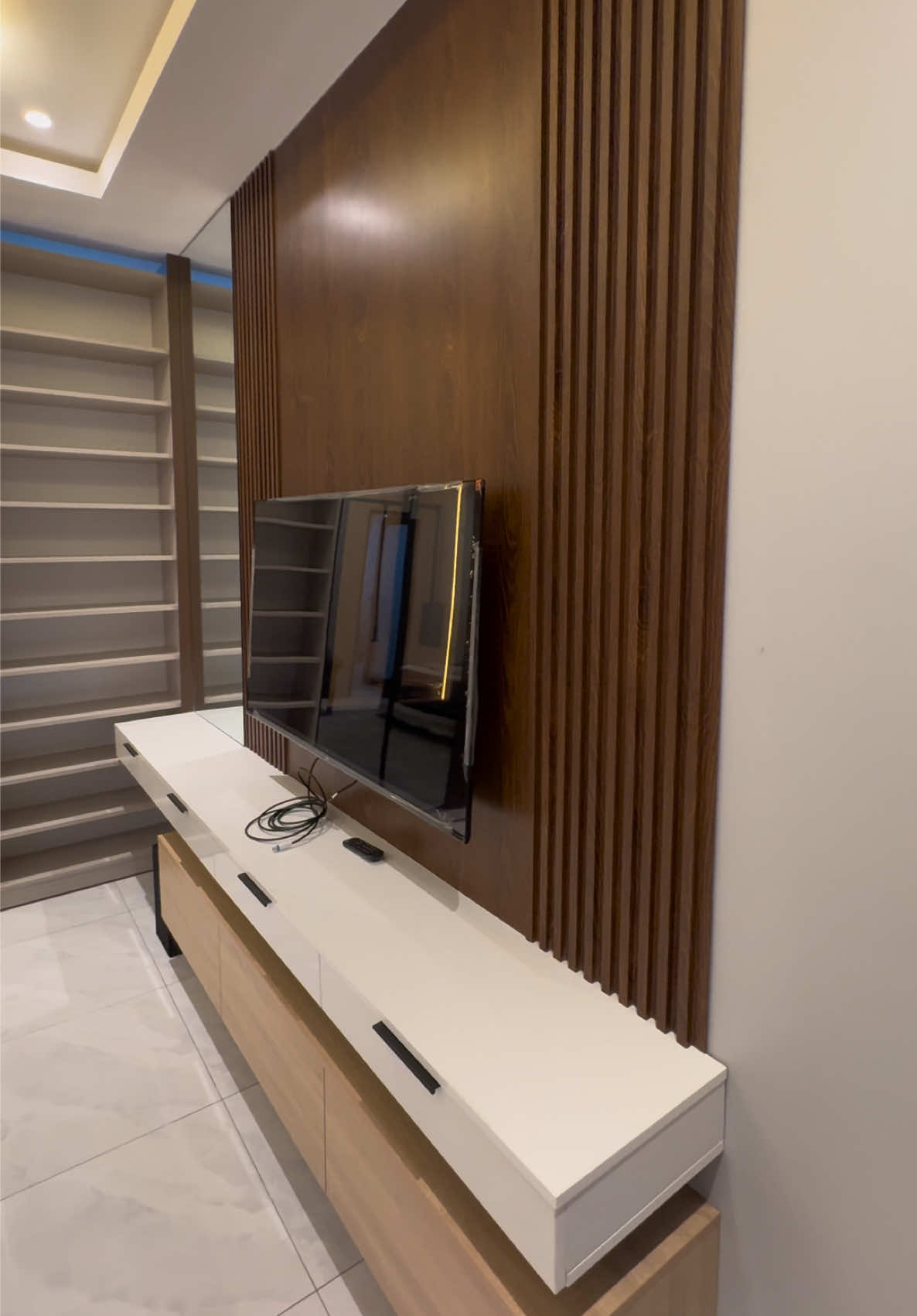 Two details that can completely transform a space. From a beautifully finished wardrobe to a sleek TV console setup, every piece was designed to bring style, function and cohesion into the home. 📞 Call/WhatsApp: 024 506 1325 📲 DM us to transform your space. #grandaurafurnishings #wardrobedesign #tvconsole #fyp #viral 