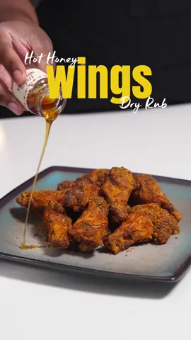 Hot honey dry rub wings hit different! I made them in the airfryer and they are so crispy! #hothoneywings #hothoneyrub #dryrub #thatsdamngood  Recipe: Ingredients * 2 lbs chicken wings * 1½ tbsp Badia Complete Seasoning, or your favorite all-purpose seasoning * 1 tbsp baking powder * 1 tbsp olive oil * 2–3 tbsp Bettergoods Hot Honey Seasoning, or enough to generously coat * Mike’s Hot Honey, or your favorite hot honey, for drizzling Instructions 1. Season the wings. Pat your wings dry, then add them to a large bowl. Season with Badia Complete Seasoning. If you don’t have it, use your favorite all-purpose seasoning or simply salt and pepper. 2. Get them crispy. Sprinkle in the baking powder and drizzle with olive oil. Toss everything together until the wings are evenly coated. 3. Air fry. Place the wings in your air fryer in a single layer. Air fry at 400°F for about 25 minutes, flipping or shaking the basket halfway through. Cook until the wings are golden, crispy, and reach at least 165°F internally. 4. Add the hot honey dry rub. As soon as the wings come out of the air fryer, transfer them to a bowl and generously sprinkle with Bettergoods Hot Honey Seasoning. I found mine at Walmart, and it’s damn good! Toss the wings while they’re still hot so that seasoning sticks. 5. Finish with hot honey. Plate them up and drizzle Mike’s Hot Honey—or whatever hot honey you love—right over the top. That’s it! Crispy, sweet, spicy, and ridiculously easy. 🔥🍯 Tip: Want even more hot honey flavor? Add another light sprinkle of the dry seasoning after you drizzle the hot honey.