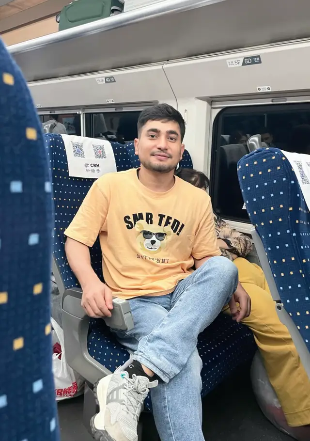 Traveling on the bullet train and listening to old nepali songs.