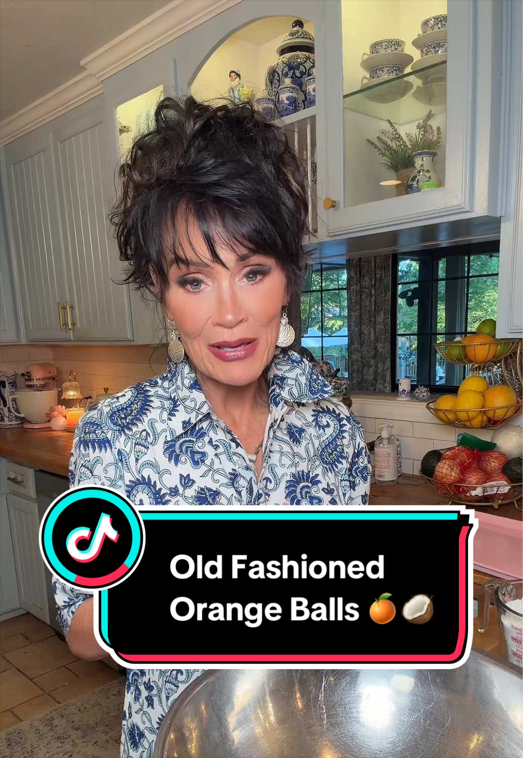 If you know me, you know I have summer foods and winter foods, and I’m just gonna say it… the “ber” (brrrr) months have the better foods. 😂 Give me the soups, chili, gumbo, sweets and all those old-fashioned holiday treats! These Orange Balls are one of those recipes I start thinking about when we get close to the holidays. I learned to make them years ago from my former next-door neighbor’s husband. He made them every holiday season, I loved them, learned how to make them from him, and I’ve been making them ever since. They’re sweet, tart, chewy, a little crunchy from the pecans, covered in coconut and powdered sugar, and SO easy. No baking. No fancy equipment. Just mix, roll and refrigerate. And if you take these somewhere, go ahead and bring the recipe because somebody is going to ask you for it. 😂 OLD-FASHIONED ORANGE BALLS 🍊🥥 • 3 cups finely crushed Nilla Wafers • 4 cups powdered sugar • 1 cup frozen orange juice concentrate • 1½ cups chopped pecans, optional • 2 cups shredded coconut • 2 tablespoons melted butter For rolling: • About ½ cup additional coconut • About 1 cup additional powdered sugar Mix everything together in a large bowl and knead it until it comes together into a soft, slightly moist dough. If your mixture is too wet to hold its shape, add a little more powdered sugar. If it seems too dry, add a little more orange juice concentrate, about a tablespoon at a time. Roll into small balls, about golf-ball size. In the same bowl, mix the additional coconut and powdered sugar. Roll each orange ball really well in that mixture until it looks like a little snowball. ☃️🍊 Place them in the refrigerator until chilled and firm. Keep refrigerated in an airtight container for about a week, or freeze them for longer storage. And listen… they MAY keep for a week, but I’ve never had to test that theory because we eat the daggum things. 😂 Sweet, tart, chewy, crunchy and ridiculously easy. Orange balls, y’all! 🍊 #recipes #nobake #holidays #nobaket #orange 