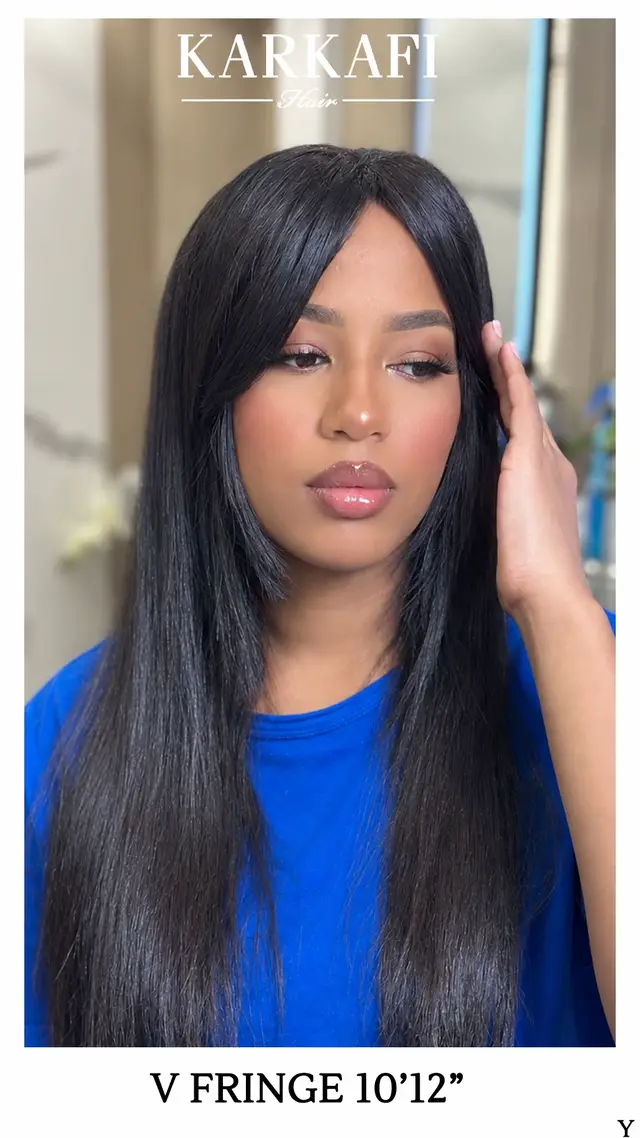Effortless elegance, a fresh look, and the perfect fringe - no cutting required. 📍 Available at Karkafi Hair For any inquiries, please contact us on +971 54 471 3388. #karkafihair #FringeStyle #HairExtensions