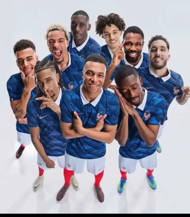 Group of men in blue soccer uniforms. Perfect for sports fans or team photos. Want to see more pics like this? Check out our page for updates! 