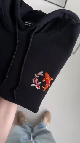 Embroidered Koi Fish — Wearable Art. Designed with a love for detail and inspired by Japanese art and culture. Detailed koi fish embroidery available on hoodies, sweatshirts and T-shirts.