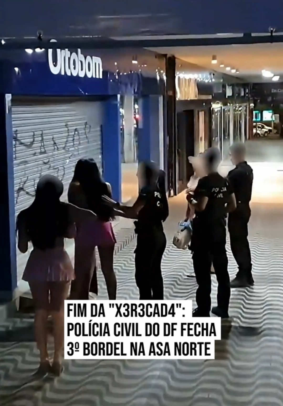 🚨 POLÍCIA FECHA BORDEL Em uma demonstração de rigor no combate à expl0r4ç4o s3xval no Plano Piloto, a Polícia Civil do Distrito Federal (PCDF), por meio da 2ª Delegacia de Polícia (Asa Norte), deflagrou uma nova operação que resultou no fechamento do terceiro estabelecimento de pr0st1tu1ç4o na Asa Norte, em um curto intervalo de tempo. A investida mais recente teve como alvo o subsolo de um imóvel comercial na SCLRN 708 Norte. O local, segundo levantamentos de campo e análise de câmeras de monitoramento, operava como ponto fixo para encontros s3xv4is remunerados, contando com estrutura de quartos e fluxo contínuo de frequentadores. Durante a operação, que contou com o apoio do 3º Batalhão de Polícia Militar da Asa Norte, os agentes cumpriram dois mandados de busca e apreensão autorizados pela Justiça, sendo um no próprio estabelecimento comercial e outro na casa da investigada, em Luziânia (GO), Entorno do DF. No decorrer das buscas, a polícia apreendeu aparelhos celulares, documentos, anotações de contabilidade informal e máquinas de cartão de débito e crédito. A decisão judicial autorizou formalmente a extração e a perícia dos dados armazenados nos eletrônicos para mapear a extensão da rede financeira do negócio. A desarticulação do ponto na SCLRN 708 Norte não é um fato isolado, mas o desdobramento de uma série de intervenções ostensivas promovidas pela 2ª DP na região da Asa Norte. Na última segunda-feira, as equipes policiais já haviam fechado uma c4sa de pr0st1tu1ç4o disfarçada sob a fachada de clínica de massagem na SCLN 410. Na ocasião, a mulher apontada como responsável pelo local foi presa em flagrante e, após audiência de custódia, obteve liberdade provisória sujeita ao uso de tornozeleira eletrônica e à proibição restritiva de se aproximar a menos de 200 metros do endereço. 🤳  @kebecfotografo #Metrópoles #DistritoFederal #Polícia 