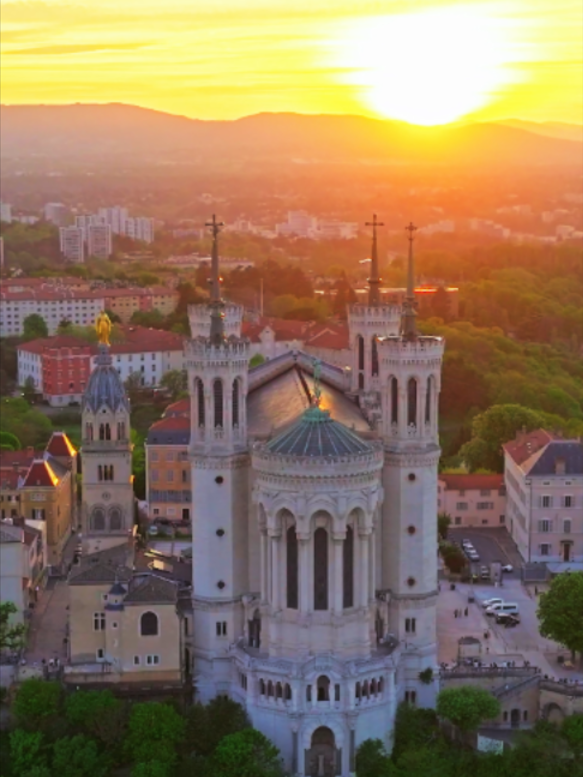 THIS FRENCH CITY IS A FAIRYTALE FROM ABOVE! 😱🇫🇷 Lyon from above—Fourvière Basilica, Place des Terreaux, Jacobins Fountain, and epic French vibes in one unforgettable drone reel. #Lyon #France #FYP