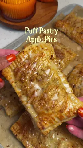 Puff Pastry Apple Pies 🥧🎃 First time using puff pastry dough, not the best aesthetically but it was so tasty. What do you think? #puffpastry #applepies #fallbaking #cozybaking #fypシ 