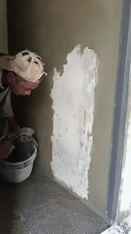 Easy way to smooth a rough wall using cement