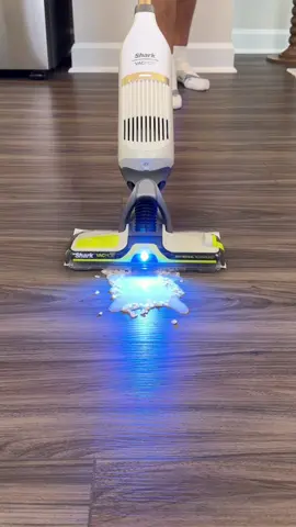 Vacuum first. Mop second. ❌ This Shark VACMOP does both at the same time..picking up debris while spraying down and cleaning your hard floors. 🧹💦 #SharkVACMOP #SharkCleaning #FloorCleaning #CleaningHacks #sharkhome 
