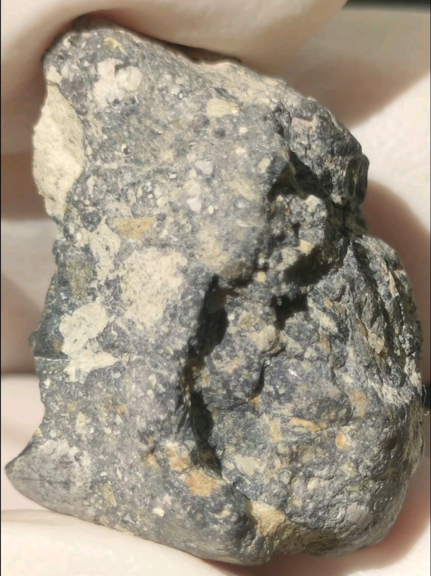 #views   (El Milhas 001) A genuine lunar meteorite bearing the official scientific name El Milhas 001.  It belongs to the feldspathic breccia type. These are lunar rocks that formed in the light-colored mountain ranges of the Moon as a result of violent asteroid impacts on its surface, which shattered the rocks and captured fragments. #the #amazing  #true  #hunter   