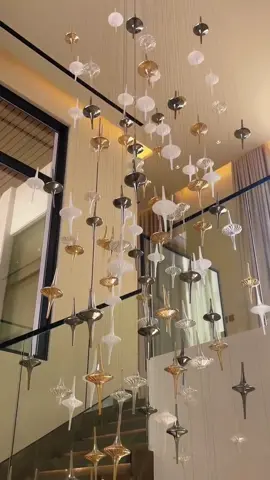 The hollow glass chandelier in the grand mansion.