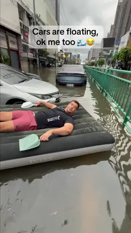 Bangkok is FLOATING 🌊😂 Cars underwater, kids playing, and everyone still smiling on one of Bangkok’s busiest roads! 🇹🇭 #Bangkok #Thailand #BangkokFlood #ThailandTravel #TravelTikTok