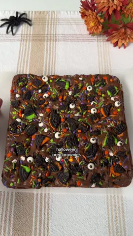 Halloween Oreo Brownies 🍫🖤 (recipe makes an 8x8 pan) Ingredients: 10 tbsp (140g) unsalted butter, melted 1 cup (200g) granulated sugar ¼ cup (50g) brown sugar 2 eggs, room temp  1 tsp vanilla extract ½ cup + 2 tbsp (56g) unsweetened cocoa powder ½ tsp salt 1 tbsp (13g) vegetable oil ½ cup (63g) all-purpose flour, spoon & level or weigh (don’t pack it in) ⅔ cup chocolate chips 9-16 halloween oreos to layer (depends how much you want, I did 16) Halloween sprinkles & candy eyes ~4 more chopped oreos (for topping)  Instructions: Preheat oven to 325°F and grease/line an 8x8 pan with parchment. In a large bowl, whisk melted butter, granulated sugar, and brown sugar until smooth.  Add eggs and vanilla, then whisk vigorously for 1-2 minutes.  Stir in cocoa powder and salt until fully combined.  Mix in oil, then gently fold in the flour until just combined (don’t over mix). Fold in chocolate chips. Spread half the batter into the lined/greased pan.  Make a layer of halloween oreos.  Spread the rest of the batter on top.  Top with chopped halloween oreos, sprinkles, and candy eyes.  Bake for 30-40 minutes or until a toothpick inserted near the center comes out with just a few moist crumbs/mostly clean (no wet batter).  Cool before slicing for clean cuts. Enjoy!  #bakingrecipe #brownies #halloweenrecipes #oreobrownies #halloween 