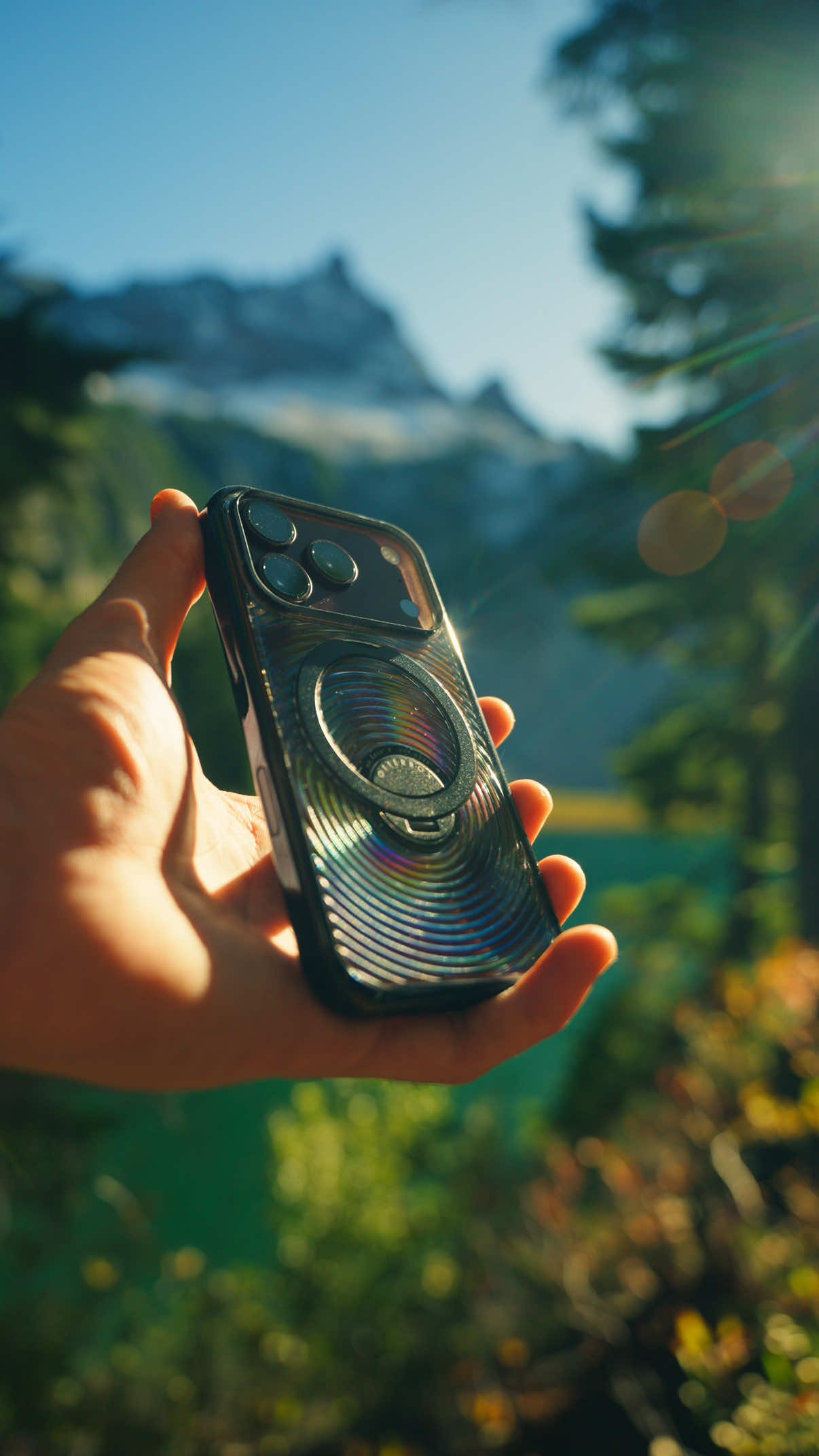 Catch that perfect pic on the trail or FaceTime mom from the road. Symmetry Series Stand is the perfect slim case companion for your travels.  📸: @orland.rocks iPhone 18 Pro case featured in Symmetry Series Stand: ♠️ Black #OtterBox #MadeForYes