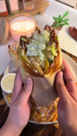 ✨Crispy Chicken Ceasar Wrap 🌯 Ingredients: For the chicken: * 500g chicken breast * 1 tsp cayenne pepper * 1 tsp black pepper * 1 tsp onion powder * 1 tsp garlic powder * 1 tsp red chilli flakes * 1 tsp dried parsley * 3 tbsp oil For the coating: * 2 cups plain flour + the same seasonings used for the chicken * 1 cup breadcrumbs * 1 tbsp Parmesan cheese * 2 eggs + ¾ cup water For the Caesar dressing: * 2 cups mayonnaise * 2 tbsp mustard sauce * 2–3 minced garlic cloves * ½ tsp black pepper * ½ tsp garlic powder * A pinch of salt * ½ cup Parmesan cheese * 2 tbsp olive oil * ⅓ cup water, or more as needed For the wrap: * Tortillas * Lettuce * Cooked chicken * Caesar dressing * Fries * Extra Parmesan cheese Method * Chicken: Marinate the chicken with all the seasonings and oil for at least 30 minutes. Coat in seasoned flour, dip in the egg mixture, then breadcrumbs mixed with Parmesan. Fry over medium heat for about 8 minutes, until golden and fully cooked. * Caesar dressing: Mix all the dressing ingredients, gradually adding water until smooth and creamy. Set some aside for dipping, then mix the rest with the lettuce. * Assemble: Spread Caesar dressing on a tortilla, add the Caesar salad, crispy chicken, extra dressing, Parmesan and fries. Fold tightly. * Crisp: Heat 3 tbsp oil in a pan over medium-low heat. Cook the wraps for about 2 minutes on each side until golden and crispy. Enjoy!🤍 #chickenceaserwrap #DinnerIdeas #EasyRecipes #quickrecipes #wraps 