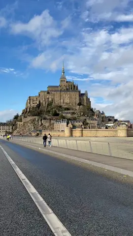 📍Mon Saitn-Michel, France 🇫🇷  Did you know Mont-Saint-Michel is famous for its dramatic tides?  At high tide, the sea can surround the island, while at low tide, vast stretches of sand appear all around it. The landscape can look completely different within just a few hours! ✨ #france #normandie #francetravel #francetiktok 