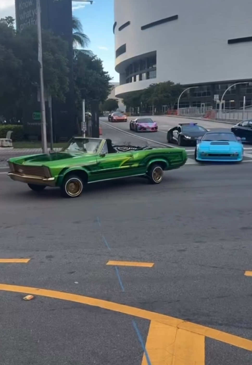 BREAKING: The developer of GTA 6 designed several real supercars that replicate the appearance of their in-game counterparts and presented them on the streets of Miami. These vehicles were equipped with Leonida state license plates and moved in a tight convoy, which included a police Lamborghini bearing the insignia of the fictional Vice City Police Department (VCPD). Additionally, the convoy featured a McLaren styled after the in-game Progen Emerus. #gta6 #gtavi #fyp #viral #trending 