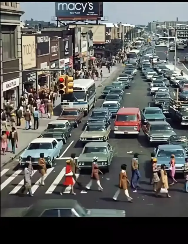 judging by The cars what year was his photo taken