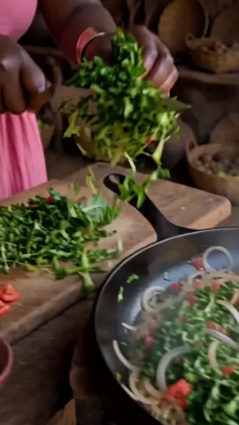 🥬🧅 Finely shredded sukuma wiki, fresh onions, and a little tomato cooked until tender and vibrant! 💚🔥 Simple ingredients, beautiful flavors, and traditional cooking made with love. 👩🏾‍🍳❤️