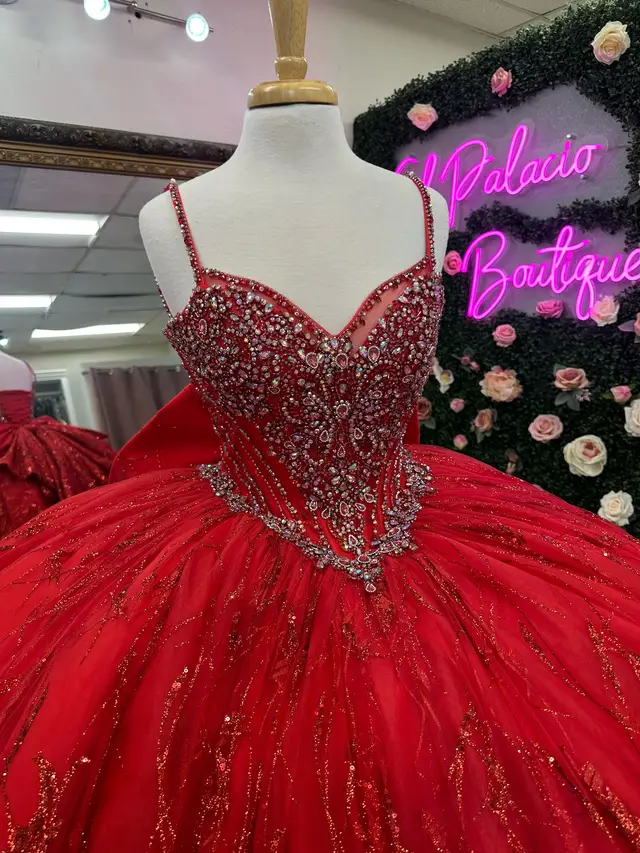 This gown's sparkle will definitely catch everyone's eye on your special day! The glitter application, the way it catches the light, and the incredible skirt and bow details make it truly stand out. #SparkleQueen #GownGoals #SpecialDay 